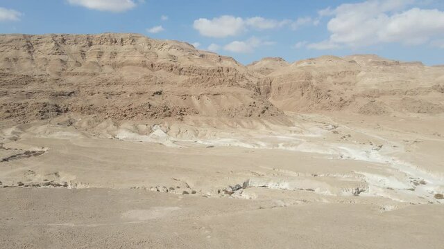 Aerial view of Desert landscape, beautiful canyons, mountains ,sands and vast arid terrain , Judean Desert Israel
