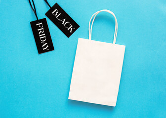ticket label Sale tag with  paperbag, black Friday or cyber monday shopper   - online shopping concept