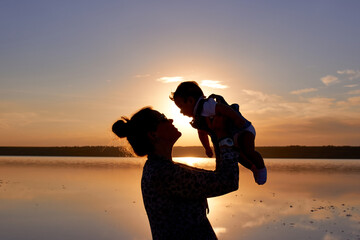 Woman with a child silhouette