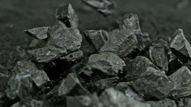 Super Slow Motion Shot of Falling and Crashing Coal at 1000 fps.