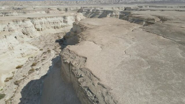 Aerial view of Desert landscape, beautiful canyons, mountains ,sands and vast arid terrain , Judean Desert Israel
