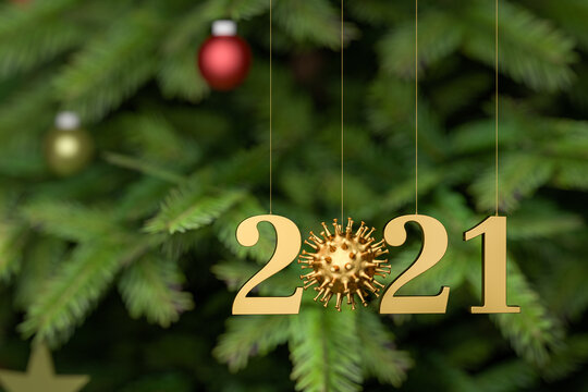 Happy New Year 2021 with Corona concept - what will the new year bring regarding Corona virus. "2021" with an embedded corona virus in front of a blurred christmas tree. Selective focus
