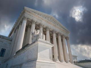 United States Supreme Court Building with stormy sky in Washington DC.   - obrazy, fototapety, plakaty