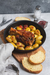 Home made family lunch or dinner Roasted pork shank with potatoes homemade lunch meat recipe