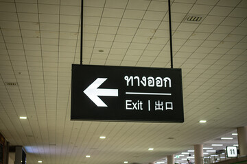 Exit signs are available in multiple languages.