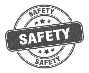 safety stamp. safety label. round grunge sign