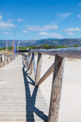 Road to the Ocean. Wooden pier at Tarifa, Cádiz, Spain.