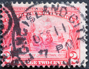 USA - Circa 1907 : a postage stamp printed in the US showing a conqueror with a flag and sword went ashore. Founding of Jamestown