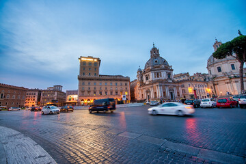 ROME, ITALY - JUNE 2014: Traffic along city streets at night