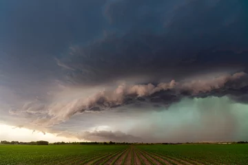 Fotobehang Severe thunderstorm with ominous storm clouds © JSirlin