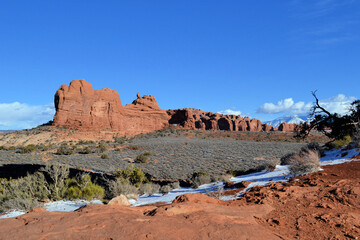 Red rocks and white snow, Arches National Park in February, Moab, Utah