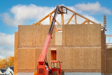 crane work on plywood house