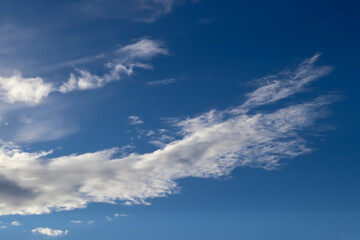 Stunning mixed cloud formation panorama in a summer sky
