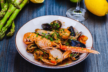 Seafood platter. Langoustine, vongole, shrimps, prawns, clams, mussels, scallop