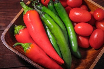 Peppers and tomatoes in a bowl.