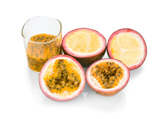 Passion fruits half and juice. Closeup, Select focus. with halfs isolated on white background.