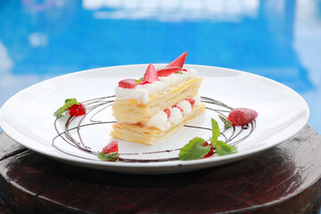 Strawberry Mille Feuille cake in white plate