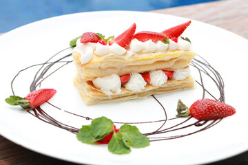 Strawberry Mille Feuille cake in white plate