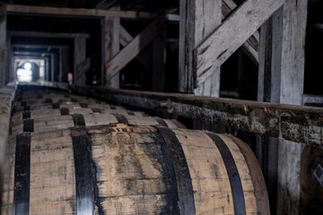 Long Lines of Bourbon Barrels in Racks