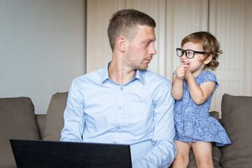 
dad tries to work online, but his child stops him.