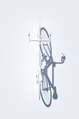 white bicycle on white background. Abstract Image of White Painted Racing Bicycle, Over Head View, Isolated Against White. Illustration, Created in 3d Software. 3d Render.