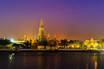 Wat Arun with Chao Phraya river at sunrise in Bangkok, Thailand
