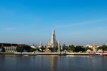 Fototapeta na wymiar Wat Arun Temple and Chao Phraya river with sky in Bangkok, Thailand