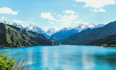 Beautiful snow-capped mountains, forests and lakes