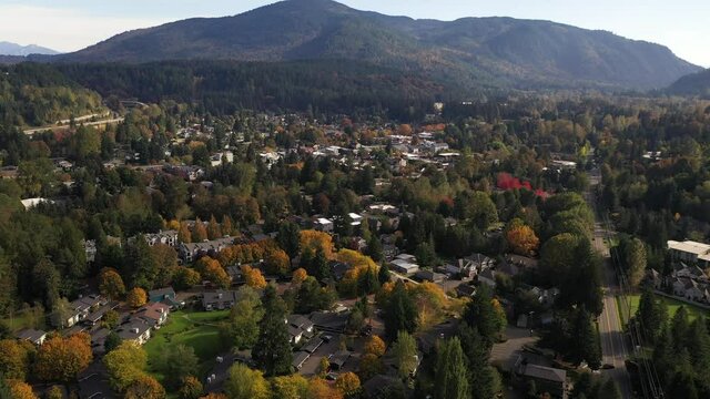 Drone footage of Issaquah, Olde Town, Sycamore, Squak Mountain, Tiger Mountain, Park Pointe, I-90 freeway, Poo Poo Point, commercial area and surrounding suburbs in King County, Washington