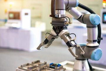 Factory 4.0 concept : View of 2 waysGripper on universal robot in smart warehouse