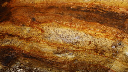 Yellow stone pattern. The background and texture of the mountain rocks are naturally beautiful. Selective focus