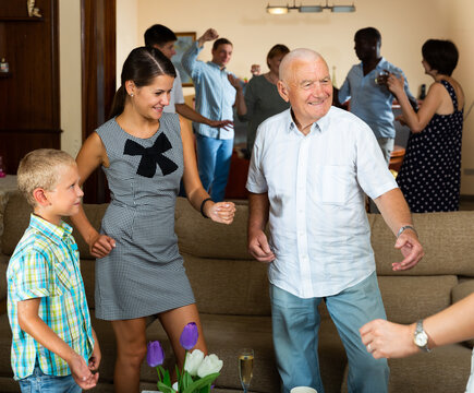 Happy Large Family Having Fun And Dancing Together At Home