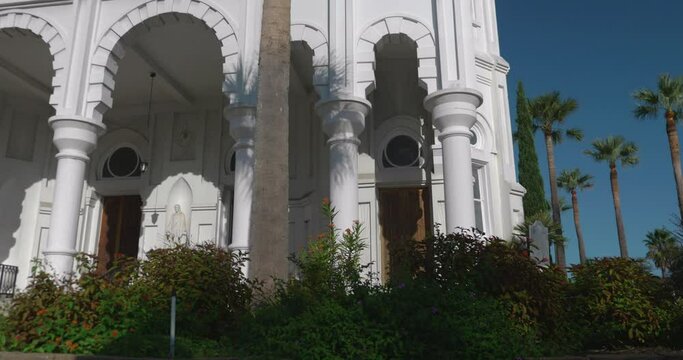 Low angle view of the Historic Sacred Heart Catholic Church on Galveston Island, Texas. This video was filmed in 4k for best image quality.