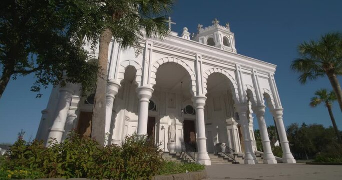 Low angle view of the Historic Sacred Heart Catholic Church on Galveston Island, Texas. This video was filmed in 4k for best image quality.