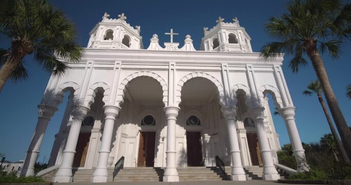 Low angle view of the Historic Sacred Heart Catholic Church on Galveston Island, Texas. This video was filmed in 4k for best image quality.