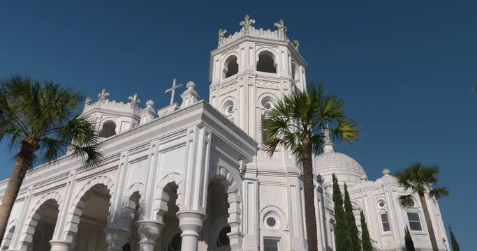 Low angle view of the Historic Sacred Heart Catholic Church on Galveston Island, Texas. This video was filmed in 4k for best image quality.