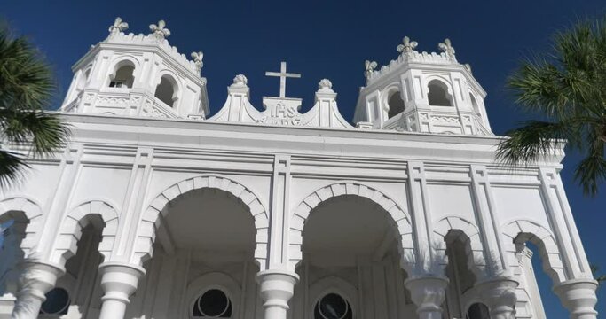 Low angle view of the Historic Sacred Heart Catholic Church on Galveston Island, Texas. This video was filmed in 4k for best image quality.