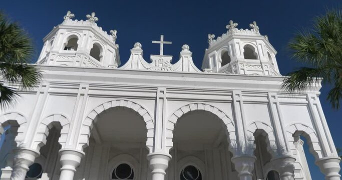 Low angle view of the Historic Sacred Heart Catholic Church on Galveston Island, Texas. This video was filmed in 4k for best image quality.
