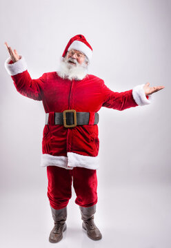 Happy Santa Claus, with arms wide open in white background