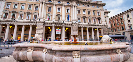 ROME, ITALY - JUNE 2014: Tourists enjoy the beautiful buildings of Montecitorio