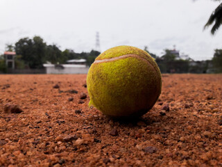 tennis ball on the ground