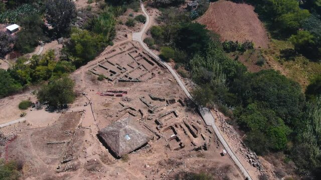 4k daytime drone aerial footage with archaeological site of Kotosh near Huanuco in Peru. Point of interest circular from left ro right wide shot.