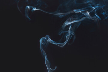 Blue smoke on dark background wallpaper