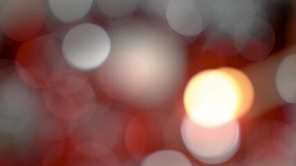 Conceptual blur, red and white Christmas bubbles with 3 lanterns that light up and a final one on top, represent the three kings and the child Jesus - Powered by Adobe