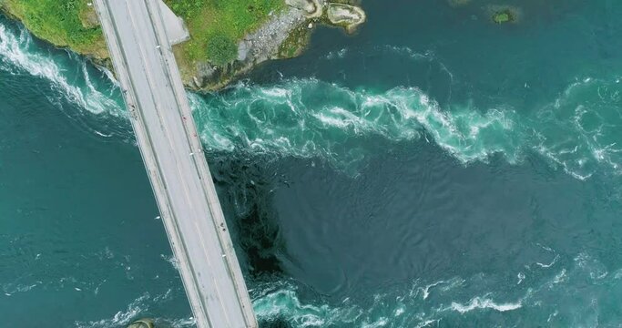 Top down view of currents in the blue arctic maelstrom Saltstraumen stream