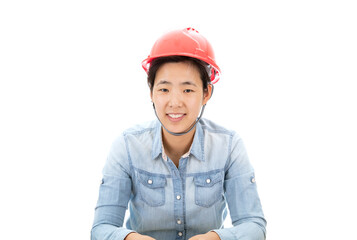 Female worker wearing hard hat smiling looking at camera in front of white background