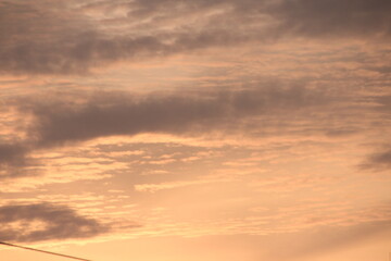 Clouds painted by the setting sun.