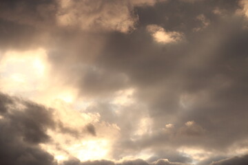 Clouds painted by the setting sun.