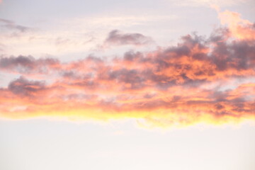 Fototapeta na wymiar Clouds painted by the setting sun.