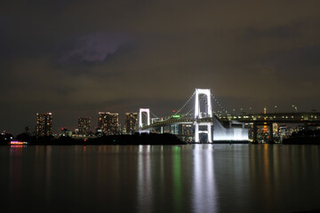 Fototapeta na wymiar Night at Rainbow Bridge, Odaiba, Tokyo